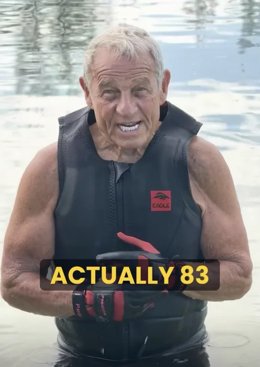 Miles Stanislaw reel: actually 83, in the water in a ski vest